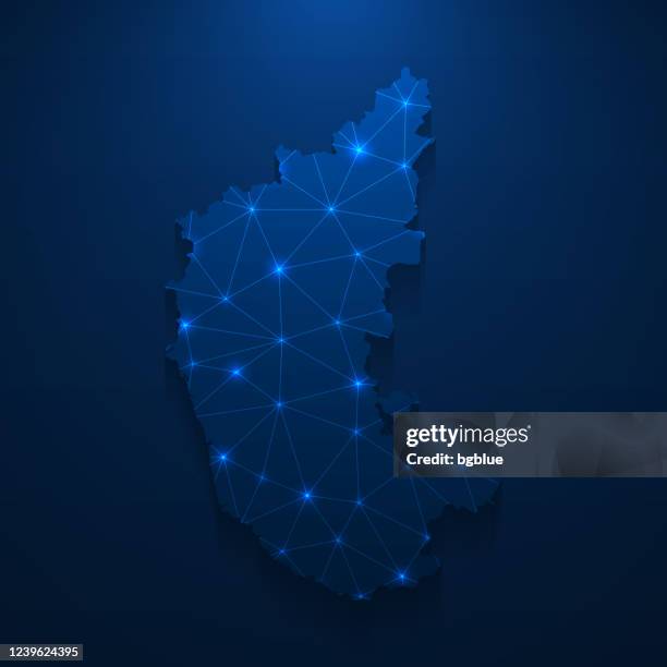 karnataka map network - bright mesh on dark blue background - karnataka stock illustrations