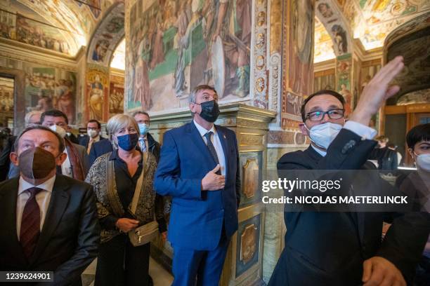 Flemish Minister President Jan Jambon and his wife An Gilops and Flemish Minister President Jan Jambon pictured during a visit to the Sistine Chapel...