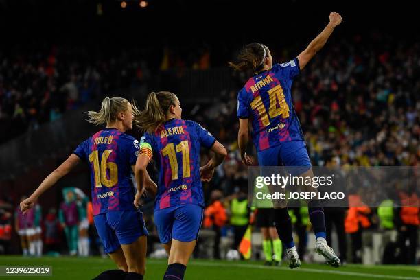 Barcelona's Spanish midfielder Aitana Bonmati celebrates after scoring a goal during the women's UEFA Champions League quarter final second leg...