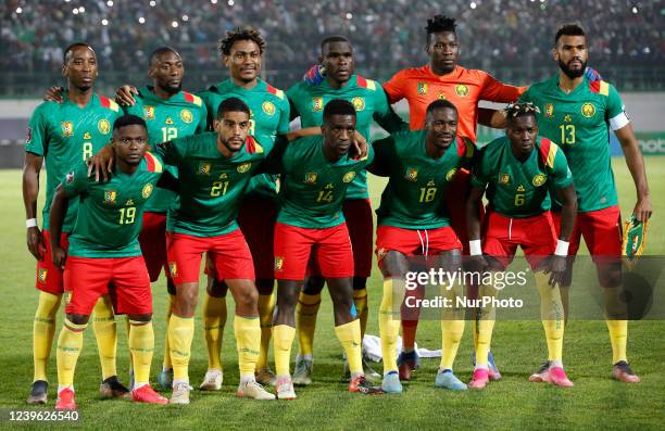 Cameroon players pose for a group photo before the second leg of the African Qualifiers soccer match for the Qatar 2022 World Cup between Algeria and...