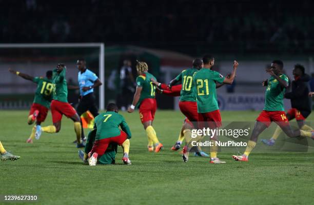 Cameroon players celebrate after beating Algeria to reach the 2022 FIFA World Cup during the FIFA World Cup Africa Qatar 2022 Qualifier match between...