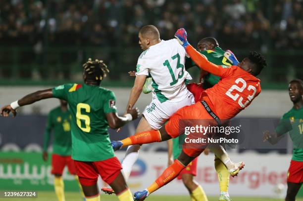 Islam Slimani of Algeria vies for the ball during the FIFA World Cup Qatar 2022 third qualifying round football match between Algeria and Cameroon at...