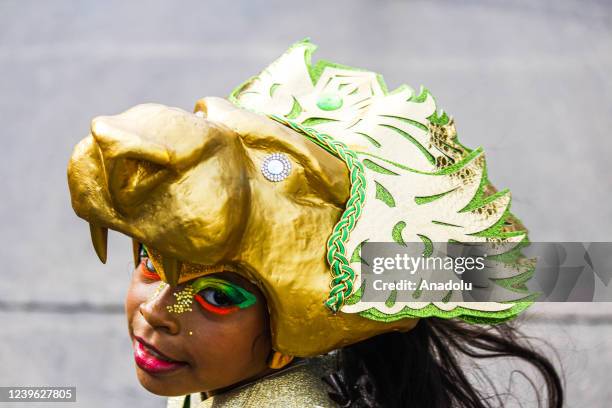 People wearing costumes take part in Barranquilla Carnival in Barranquilla, Colombia on March 27, 2022. Folk festival, "Masterpiece of the Oral and...