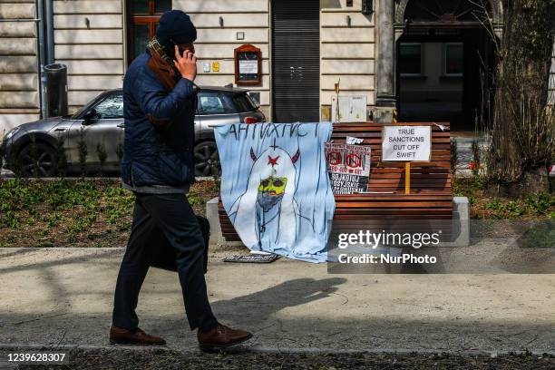 Banners expressing solidarity with Ukraine are seen at the square in front of the Consulate General of Russia which was unofficially named the Square...