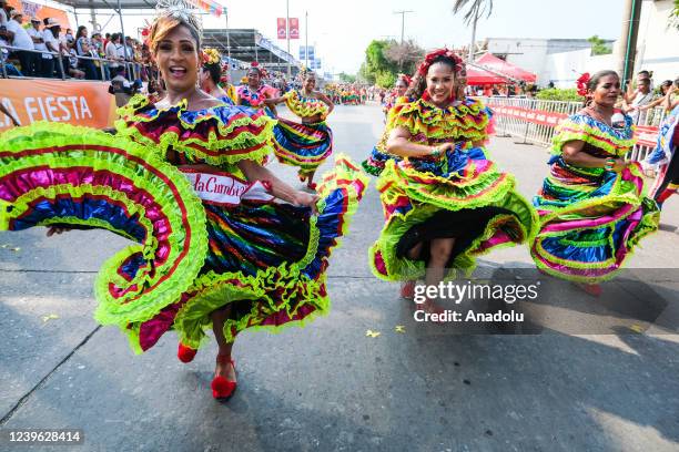 People wearing costumes take part in Barranquilla Carnival in Barranquilla, Colombia on March 26, 2022. Folk festival, "Masterpiece of the Oral and...