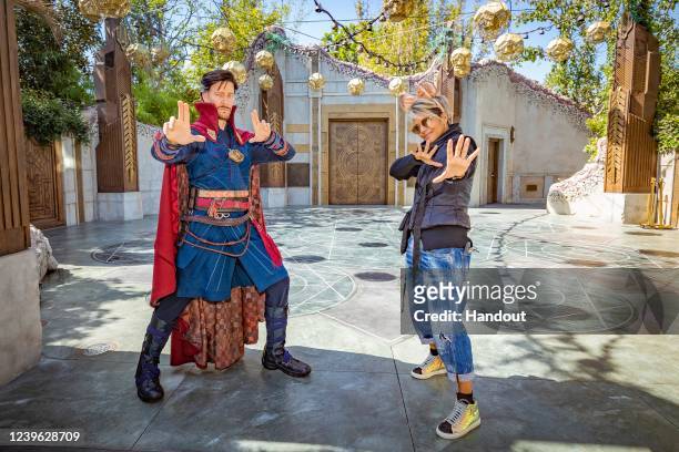 In this handout photo provided by Disneyland Resort, Halle Berry poses with Doctor Strange during a visit to Avengers Campus in Disney's California...