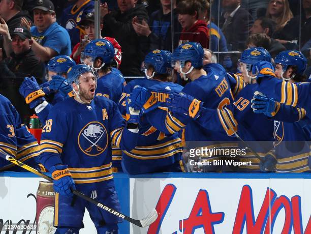 Zemgus Girgensons of the Buffalo Sabres celebrates his second goal of the game against the Winnipeg Jets during the second period of an NHL game on...