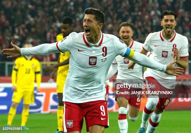 Poland's forward Robert Lewandowski reacts during the FIFA World Cup Qatar 2022 qualifying football match Poland v Sweden at the Slaski Stadium in...