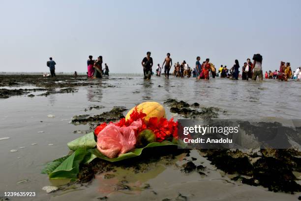 Hundreds of devotees have bath in the river Baruni in the hope of getting rid of their sins in Chittagong, Bangladesh on March 30, 2022. Thousands of...