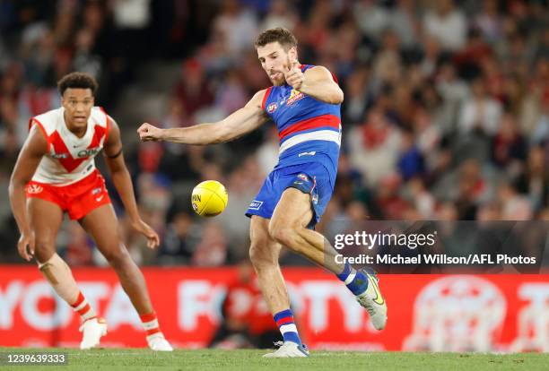 Marcus Bontempelli of the Bulldogs kicks the ball during the 2022 AFL Round 03 match between the Western Bulldogs and the Sydney Swans at Marvel...