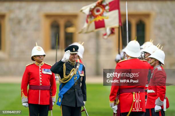 Prince Edward, Earl of Wessex presents new colours to the Royal Gibraltar Regiment during a ceremony at Windsor Castle on March 31, 2022 in Windsor,...
