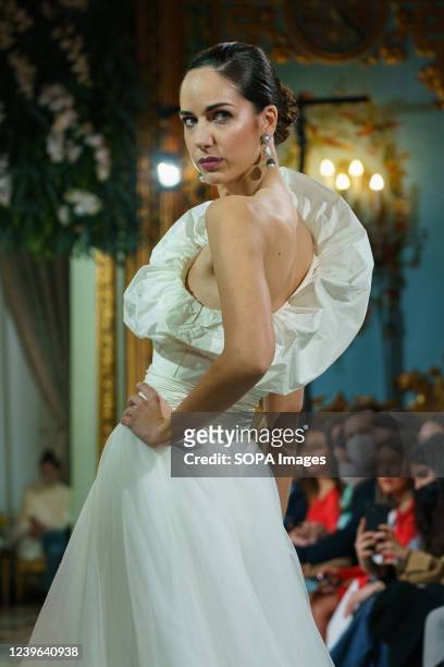 Model showcases Silvia Fernandez design during the Atelier Couture bridal catwalk within Madrid Fashion Week, held at the Santonia Palace in Madrid.