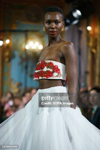 Model showcases Fraile design during the Atelier Couture bridal catwalk within Madrid Fashion Week, held at the Santonia Palace in Madrid.