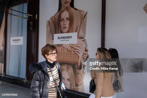 Large scale advertising posters for the high end fashion house Burberry outside Harrods in Knightsbridge on 25th March 2022 in London, United...