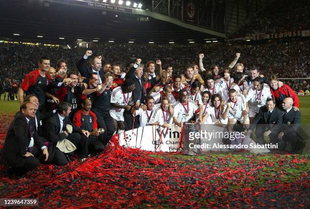 Milan players and staff celebrate the victory with the trophy during the Final Champions League match between Juventus and AC Milan at Old Trafford...