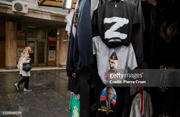 Shirts picturing Russian president Vladimir Putin and the letter Z used by Russian forces during the offensive in Ukraine are for sale in a shopping...