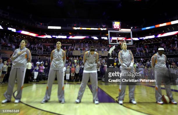 Sidney Spencer, Candice Dupree, Diana Taurasi, Penny Taylor and Marie Ferdinand-Harris of the Phoenix Mercury stand attended for the National Anthem...