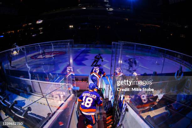 Mathew Barzal and Anthony Beauvillier of the New York Islanders walk out onto the ice prior to the start of the game against the Columbus Blue...