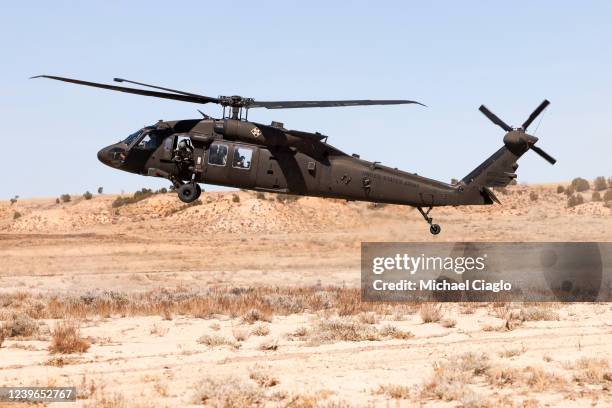 Cavalry scouts with the 2nd Stryker Brigade Combat Team land in a Blackhawk helicopter as they participate in Operation Steel Eagle on March 31, 2022...