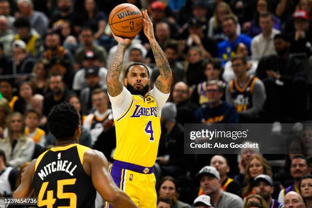 Augustin of the Los Angeles Lakers shoots over Donovan Mitchell of the Utah Jazz during the first half at Vivint Smart Home Arena on March 31, 2022...