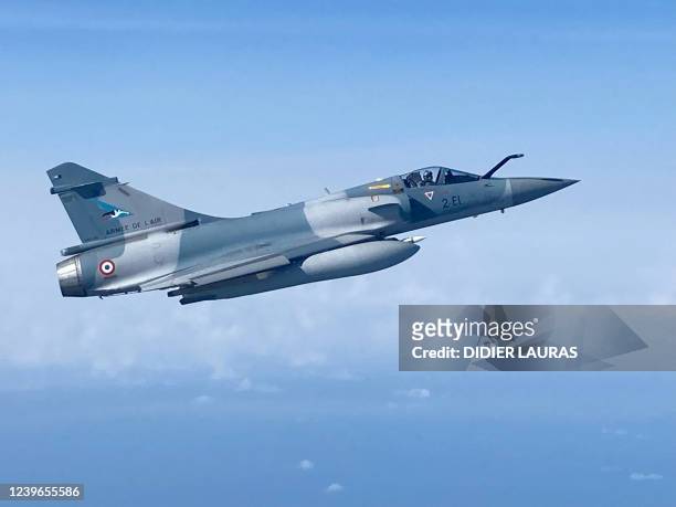 Picture shows a French Mirage 2000 fighter jet flying over Estonia, on March 30, 2022. - France has taken from Belgium air patrolling duties over...