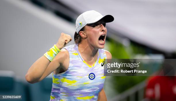 Iga Swiatek of Poland celebrates converting match point against Jessica Pegula of the United States in her semi-final match on day 11 of the Miami...