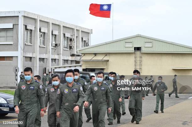 Taiwanese Air Force pilots leave after President Tsai Ing-wen delivered a speech at a military base in Hsinchu on April 1, 2022.