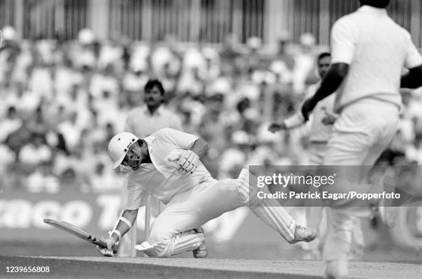 New Zealand captain John Wright falls to his knees after trying to avoid a bouncer from England bowler Devon Malcolm during the 2nd Texaco Trophy One...