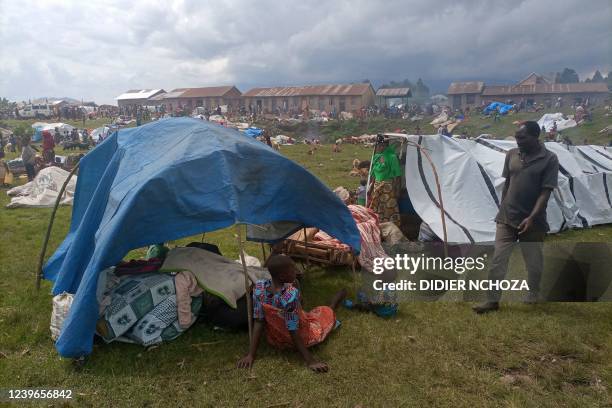 Refugees from the Democratic Republic of Congo are seen at makeshift shelters in Kisoro, Uganda, on March 31, 2022. - Thousands of Democratic...