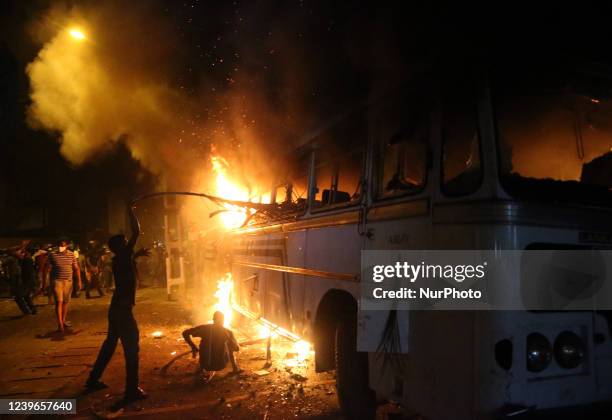 Protesters burn a bus outside the Sri Lankan president's private residence in Colombo, Sri Lanka on March 31, 2022. Protest against the president as...