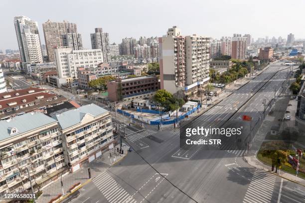 General view shows empty streets during the second stage of a Covid-19 lockdown in the Yangpu district in Shanghai on April 1, 2022. - China OUT /...