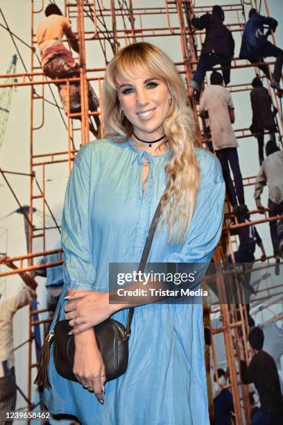 Annemarie Eilfeld attends the opening of Elliott Landy's "Woodstock Vision" exhibition at Kranzler Eck on March 31, 2022 in Berlin, Germany.