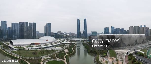 This aerial photo taken on April 1, 2022 shows the Hangzhou Olympic Sports Centre Stadium and Hangzhou Olympic Sports Centre Gymnasium , venues of...