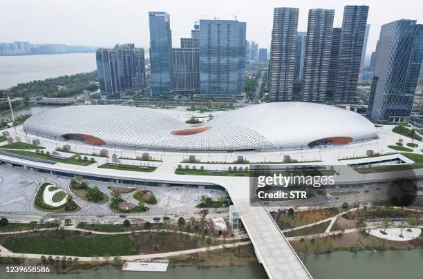 This aerial photo taken on April 1, 2022 shows the Hangzhou Olympic Sports Centre Gymnasium, a venue of the 19th Asian Games, in Hangzhou in China's...
