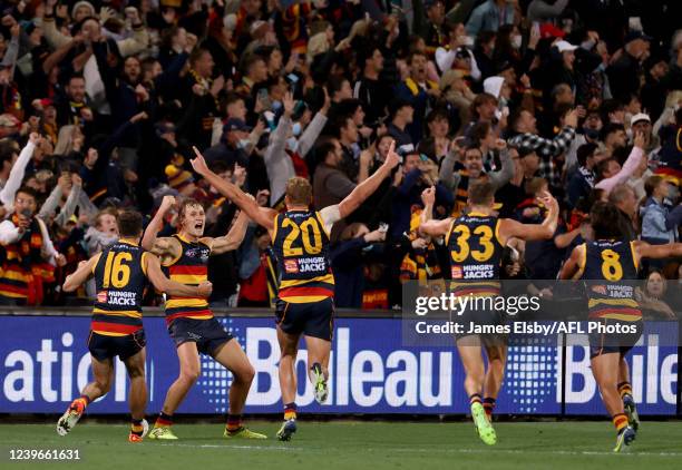 Jordan Dawson of the Crows celebrates kicking the winning goal during the 2022 AFL Round 03 match between the Adelaide Crows and the Port Adelaide...