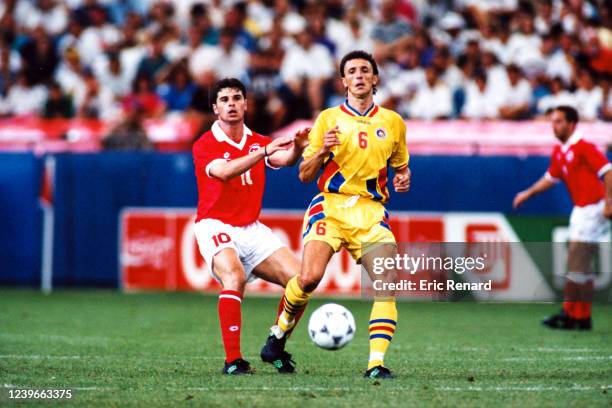Ciriaco SFORZA of Switzerland and Gheorghe POPESCU of Romania during the FIFA World Cup, Group A match between Romania and Switzerland, at Pontiac...