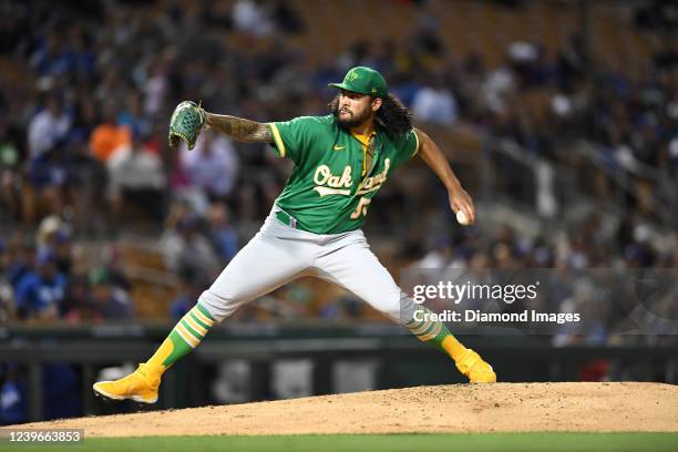 Sean Manaea of the Oakland Athletics throws a pitch during the third inning of an MLB spring training game against the Los Angeles Dodgers at...