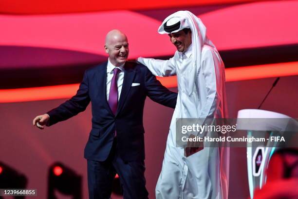 President Gianni Infantino Qatar's Emir Sheikh Tamim bin Hamad al-Thani during the FIFA World Cup Qatar 2022 Final Draw at Doha Exhibition and...