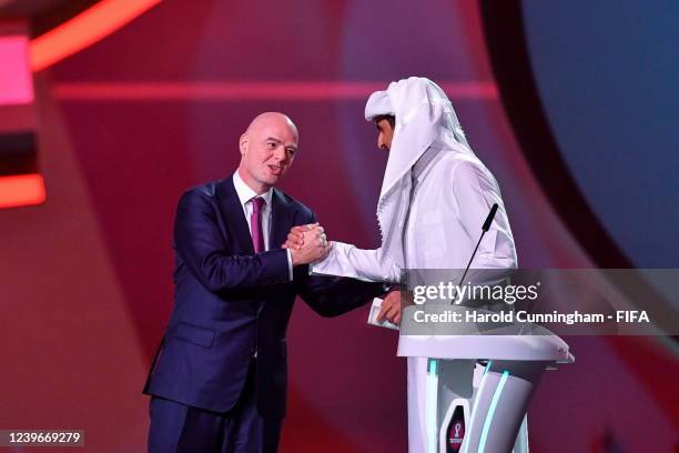 President Gianni Infantino with Qatar's Emir Sheikh Tamim bin Hamad al-Thani during the FIFA World Cup Qatar 2022 Final Draw at Doha Exhibition and...