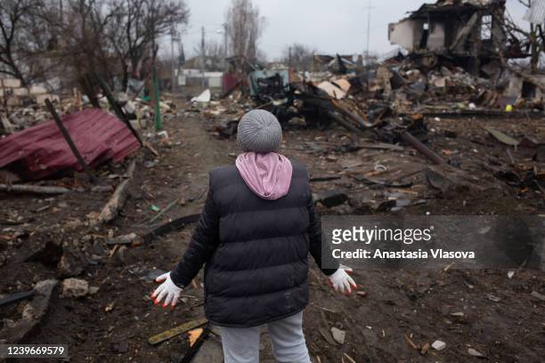 Natalia Hrom, a local resident, reacts as she describes the destruction in the village on April 1, 2022 in Svitylnia, Ukraine. After 5 weeks of war,...