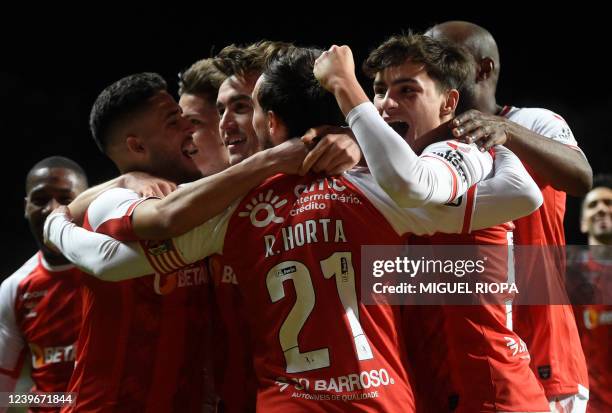 Sporting Braga's Portuguese midfielder Andre Horta celebrates with teammates after scoring a goal during the Portuguese League football match between...