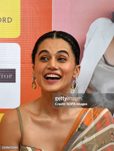 Bollywood actress Taapsee Pannu smiles during 'Yuktahaar' book launch in Mumbai. 'Yuktahaar' is a book about traditional Indian foods, ancient Indian...