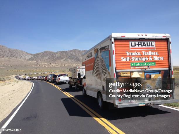 Black Rock Desert, NV Cars wait in line to get into the Burning Man festival, held 120 miles north east of Reno.