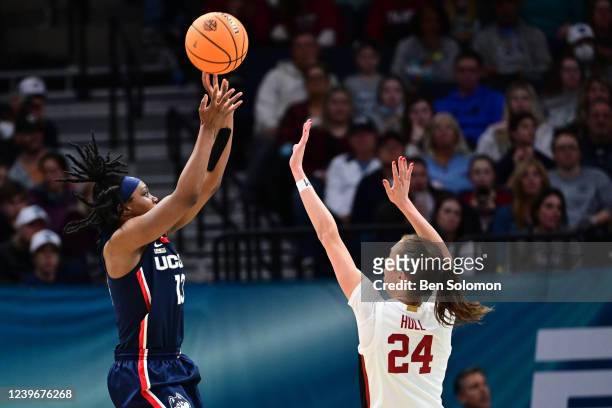 Christyn Williams of the Connecticut Huskies shoots over Lacie Hull of the Stanford Cardinal during the semifinals of the NCAA Womens Basketball...
