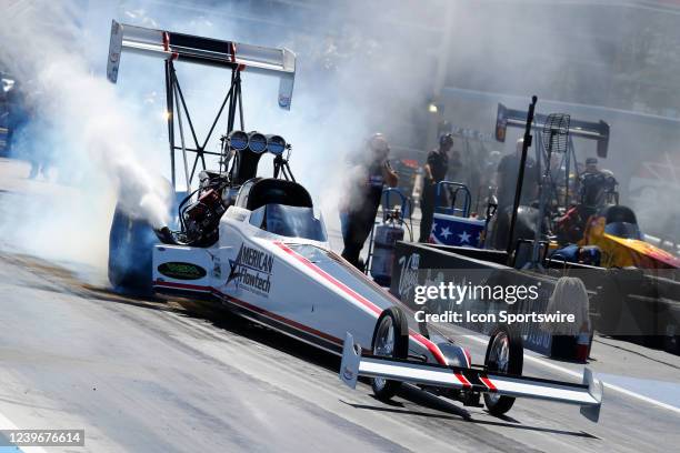 Jim Maroney American Flowtech NHRA Top Fuel Dragster does a burnout during the NHRA Four-Wide Nationals on April 1, 2022 at The Strip at Las Vegas...