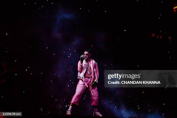 Puerto Rican rapper Bad Bunny performs onstage during "The Last Tour Of The World" at FTX Arena in Miami, Florida on April 1, 2022.