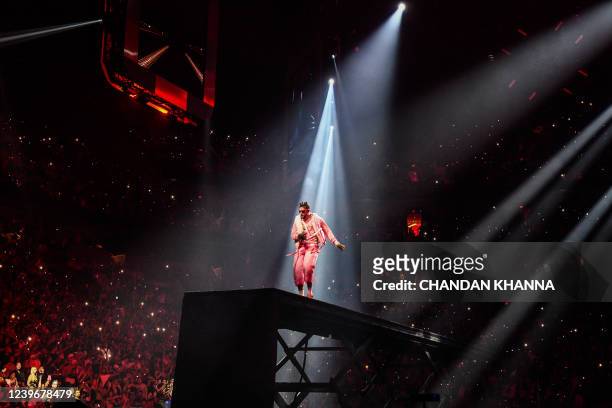 Puerto Rican rapper Bad Bunny performs onstage during "The Last Tour Of The World" at FTX Arena in Miami, Florida on April 1, 2022.