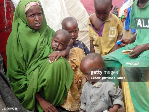 March 2022, Somalia, Mogadischu: Safiyo Abdullahi, a drought-stricken mother of six, arrived at the Al-Hidaya camp for internally displaced people on...