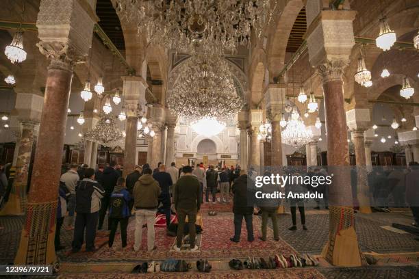 Muslims perform the first 'Tarawih' prayer on the eve of the Islamic holy month of Ramadan at Al-Zaytuna Mosque in Tunis, Tunisia on April 2, 2022.