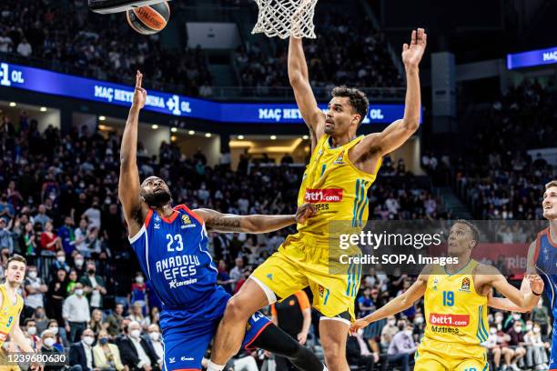 Oscar Da Silva of Alba Berlin and James Anderson of Anadolu Efes Istanbul seen in action during the Round 33 of the 2021/2022 Turkish Airlines...